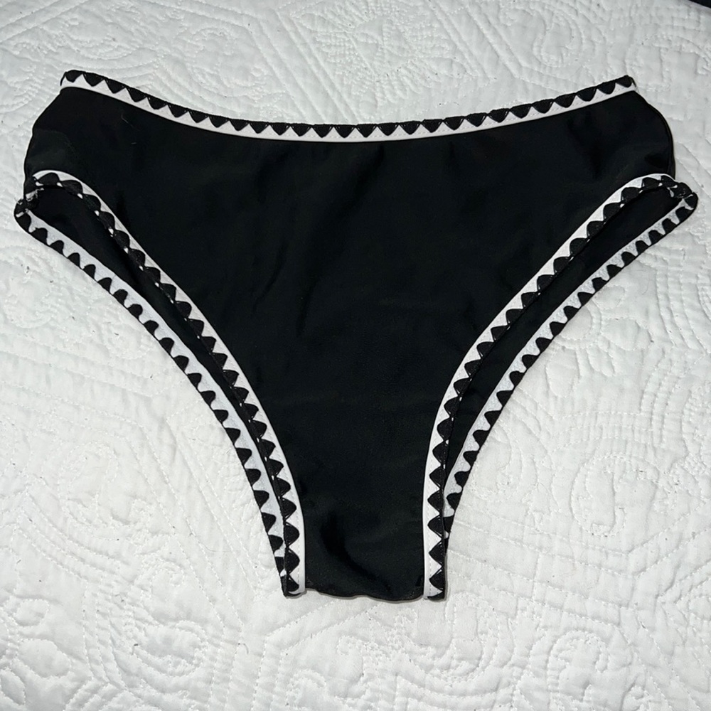 Black shein bikini bottoms with crochet details